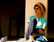 A girl sitting in thought