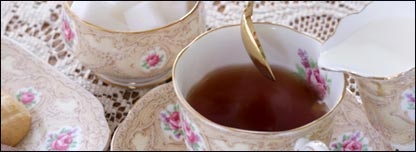 Scones, tea, sugar and milk