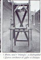 Ffram i rwymo carcharorion ar gyfer eu chwipio