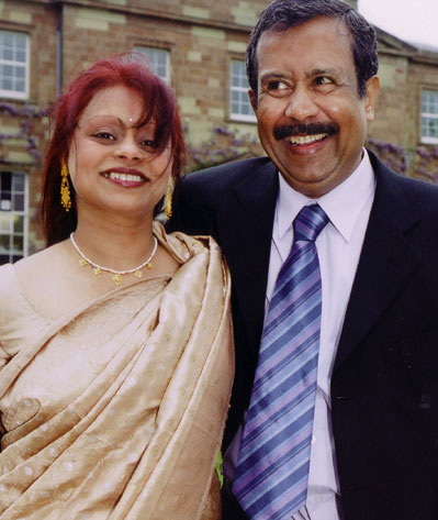 Rozana at the garden party with her husband