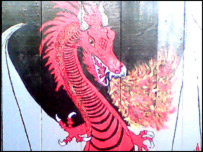 Dragon painted on a wooden surface