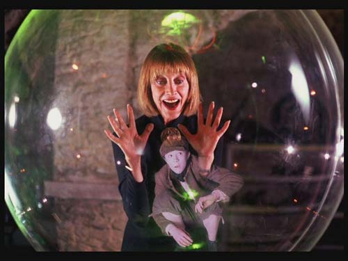 A woman looks into a crystal ball and sees a young boy who's a Victorian ghost!