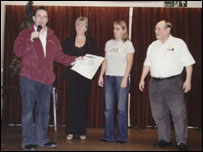 Tim Wedgwood receiving a cheque