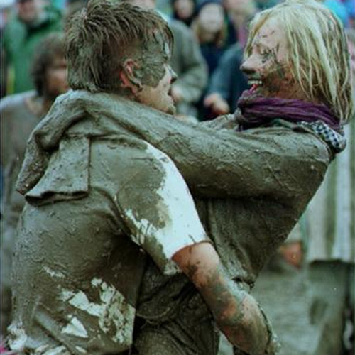 Muddy festival-goers at Glastonbury