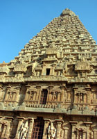 Pyramidal granite temple covered with sculpture and statues