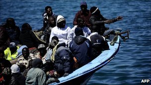 Migrants from Africa crowded into a small boat
