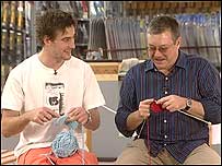 Two men knitting