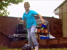 Mitchell playing kick about with a football