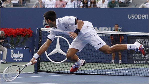 Djokovic reaches for another ball in the final against Nadal