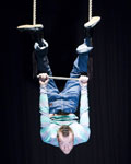 Daryl Beeton performing on a trapeze in 'Moments in Motion'