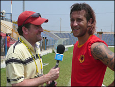 RIchard Connelly catches Carlos after training