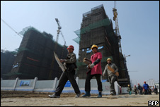 Workers at a building site in Anhui Province, China