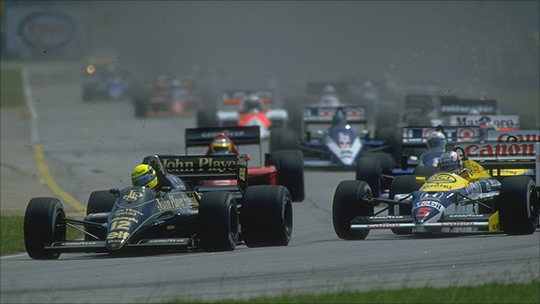 Ayrton Senna's Lotus and Nigel Mansell's Williams at the start of the 1986 Brazilian Grand Prix
