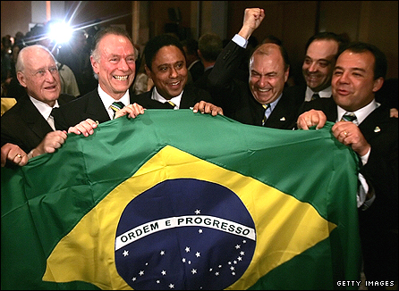 Brazilian delegates celebrate during the International Olympic Committee (IOC) announcement of which cities will move to the final round of bidding for the 2016 Summer Games