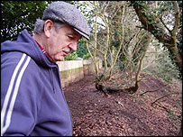 John looking down the bank