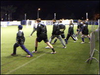 Football players warming up