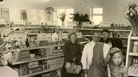 Customers in a co-operative run supermarket