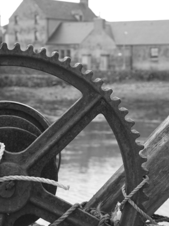 Old machinery, Rodel Pier, Rodel Hotel in Background