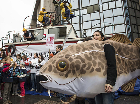 Woman dressed as a fish on a WWF demonstration in Brussels