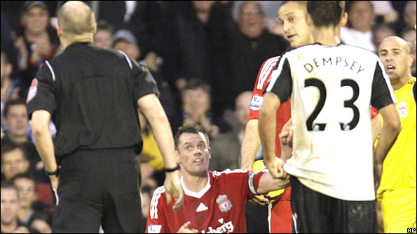 Jamie Carragher about to be sent off by Lee Mason at Fulham