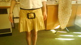 Yellow mini skirt...