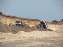 Sea defence work by local resident