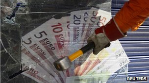 A hammer smashing a window with a euro notes painted on it