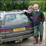 Brian and his wife with their mole mobile - note the numberplate