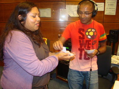 Adil begins to hand out notes of 'Money'