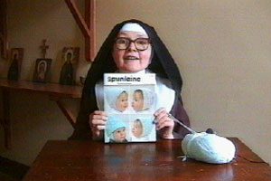 Sister Mary Francis makes a tiny garment