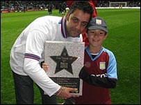 Phil & James Upton with star