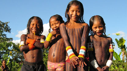 Some of the younger members of the Kayapo tribe pose for the camera.