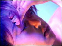 Mulher com enxaqueca