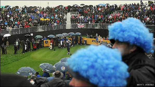Stewart Cink tees off in testing conditions on the first tee on Friday