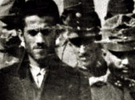Photograph showing Gavrilo Princip, on trial for the murder of Archduke Franz Ferdinand and his wife arriving at court.