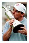 Paul Lawrie kisses the Claret Jug
