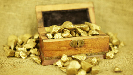Wooden box with gold nuggets