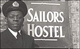 Weat Indian seaman outside a newcastle sailors hostel
