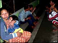 Matka s dítětem v Banda Acehu