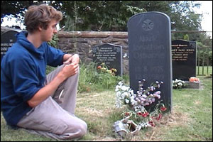 Simon at his brother's grave