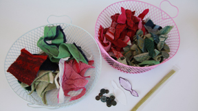 leaf garland materials - two baskets filled with various sizes and colours of fabric