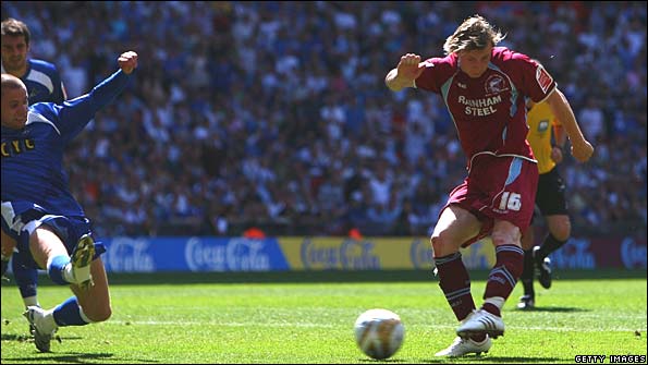Martyn Woolford scores