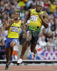 Álex Quiñonez y Usain Bolt
