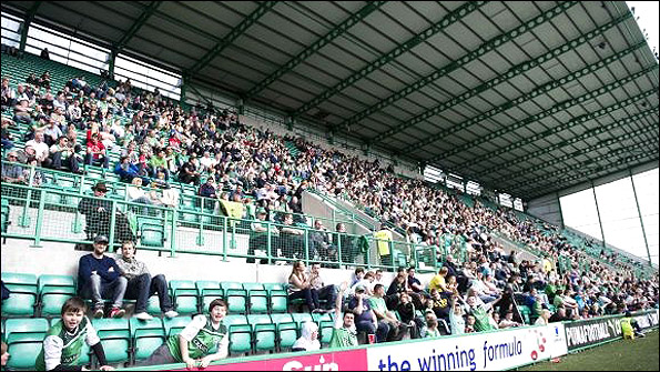 Fans at some SPL grounds may once again be able to stand at the match - but would Hibs consider such a move having completed its all-seater stadium? Photo: SNS