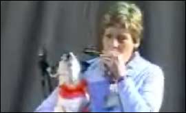 Singing Dog and harmonica player