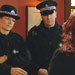 The police stop Sharon in the pub