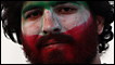 Man with an Iranian flag on his face