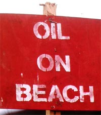 Oil spill sign
