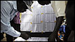 Sudan voters search for their names on the voters list in Juba, South Sudan