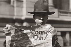 American boy scout Maurice Black Rosemaur with a Liberty Loan poster